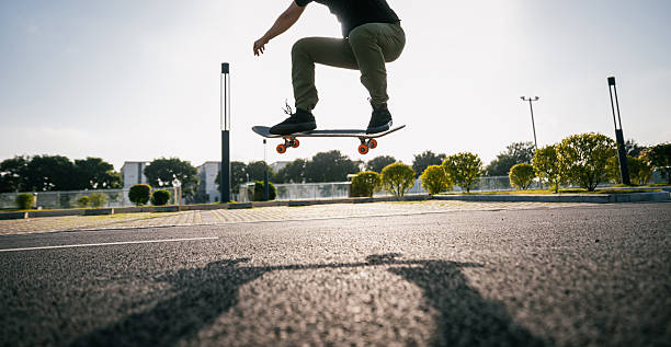 istock Skateboarder skateboarding outdoors in city 2251648902
