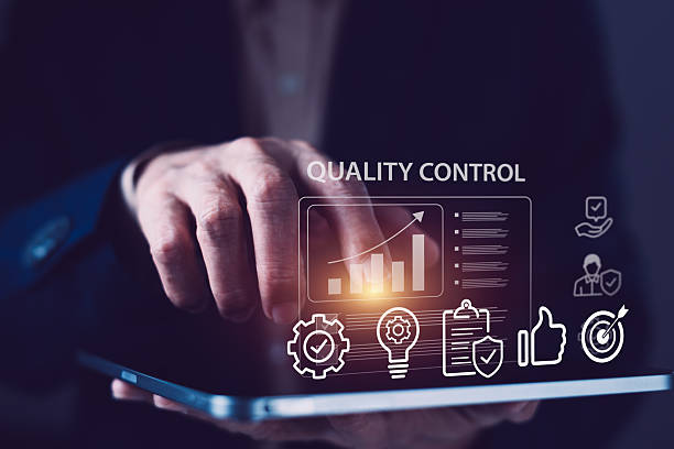 istock Businessman using tablet with quality control dashboard showing growth chart, checklist, thumbs up, and target icons for process management 2251650229
