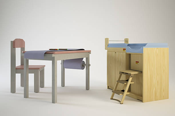 istock Childs desk with chair and a changing table. 2251650954