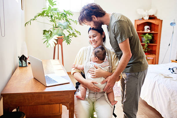 istock Happy Family Moment While Working from Home with Baby 2251654918