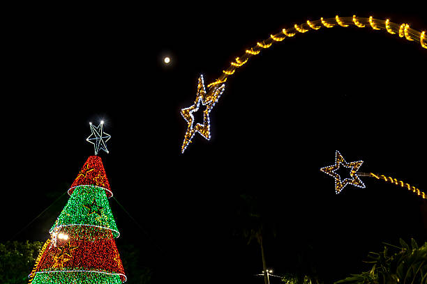 istock Christmas lights shooting star and tree 2251656181