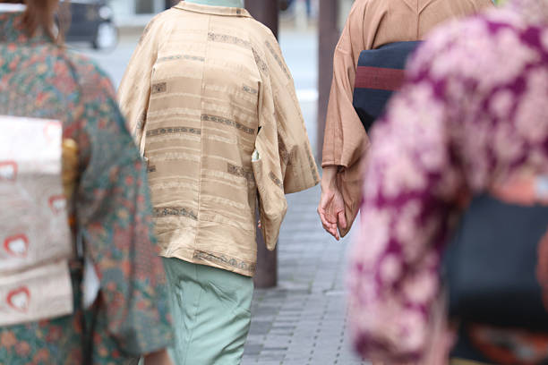 Young woman in hakama looking over shoulder - graduation day
