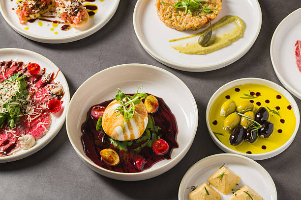 istock Colorful Mediterranean starters with olives, cheese, and vibrant sauces 2251666617