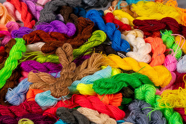 istock Colorful threads for crafting and embroidery on a table 2251670716