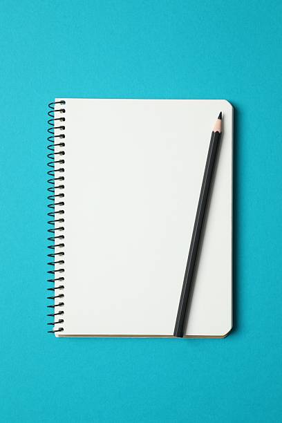 istock Flat lay with pencil and notebook on color background, top view 2251684463