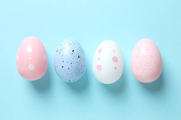 istock Happy Easter. Colorful eggs on color background, space for text or advertising 2251684628