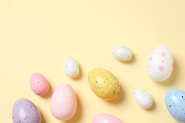 istock Happy Easter. Colorful eggs on color background, space for text or advertising 2251684694