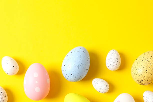 istock Happy Easter. Colorful eggs on color background, space for text or advertising 2251689706