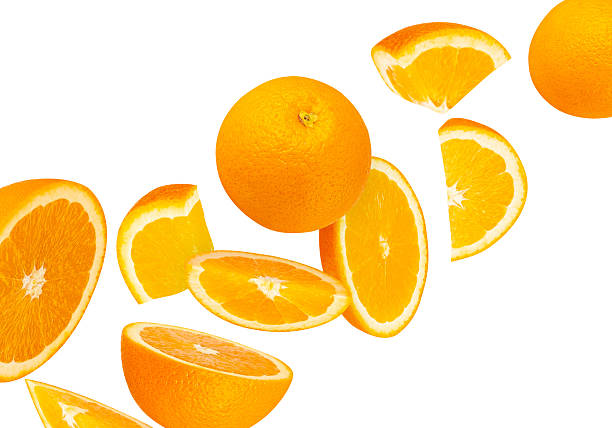 istock Falling Orange Fruit isolated on white background with clipping path, full depth of field 2251690663