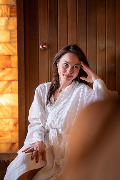 istock Woman enjoying spa bath robe relaxation. Stock image 2251690710