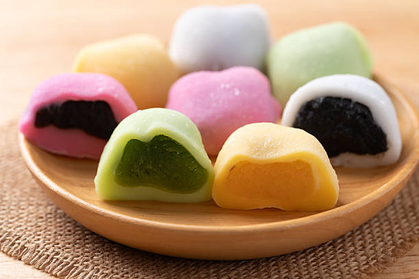 istock Daifuku mochi (Traditional Japanese sweet) stuffed with soybean, matcha green tea, sesame seed and red bean paste 2251691642