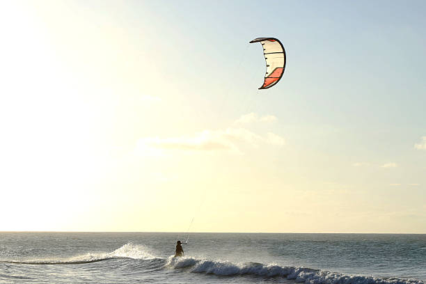 istock Afternoon on beach, kitesurfing in windy day 2251694729