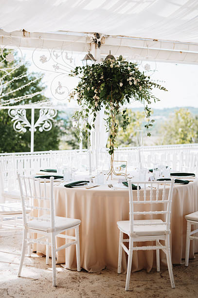 istock Wedding table with fresh flowers decoration. Forest / garden wedding 2251695486