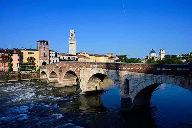 Ponte Pietra Roman Stone Arch Bridge and Tower with Verona Cityscape