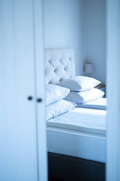 istock Cozy bedroom interior with comfortable bed and pillows. Stock image 2251699055