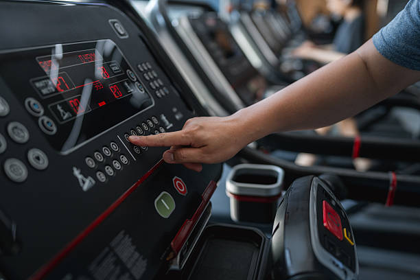 istock Sporty man drinking whey protein shake as he cools down on the treadmill 2251700058