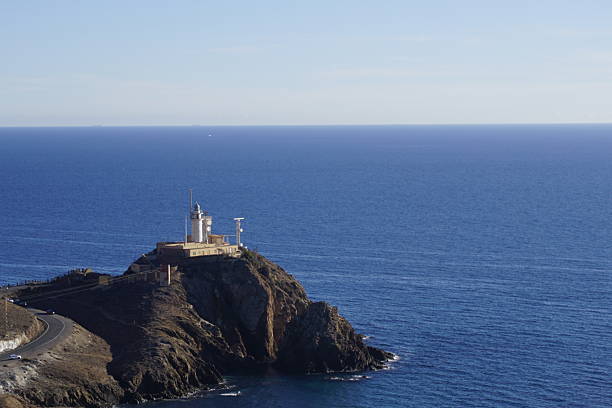 The Gata lighthouse, located in Cabo de Gata, was built in 1863, is 18 meters high, flashes every 30 seconds at more than 50 meters above sea level, where it can be seen from 30 miles away