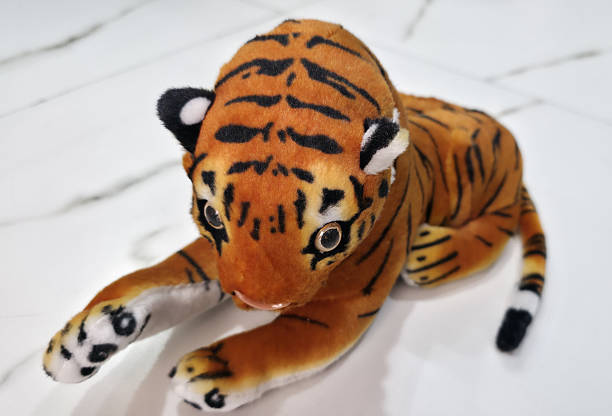 istock Adorable Stuffed Tiger Toy Close-Up 2251701749