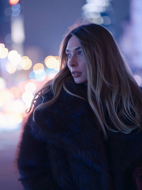 istock Close Up Portrait Thoughtful Woman Night Bokeh Light 2251704252