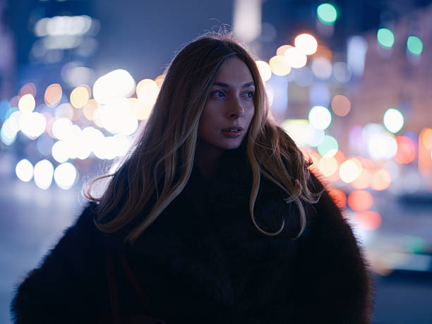 istock Close Up Portrait Thoughtful Woman Night Bokeh Light 2251709732