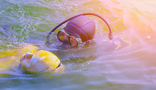 Diving competitor in air, shot from above