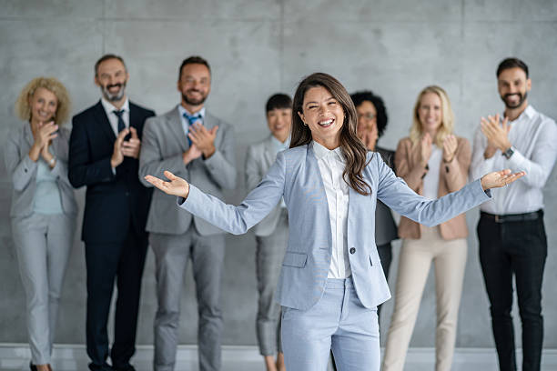 istock Businesswoman Receives Applause During Presentation 2251712461