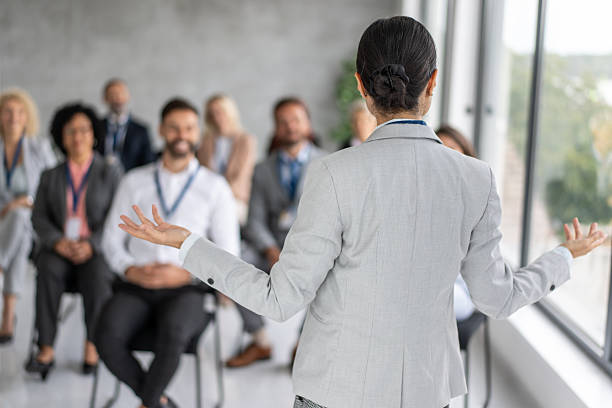 istock Inspirational Speaker Presenting Key Concepts to the Group 2251712487