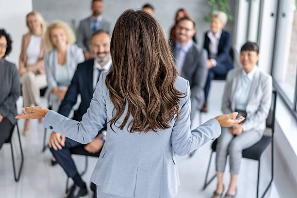 istock Motivational Speaker Presenting to Engaged Corporate Team 2251712493
