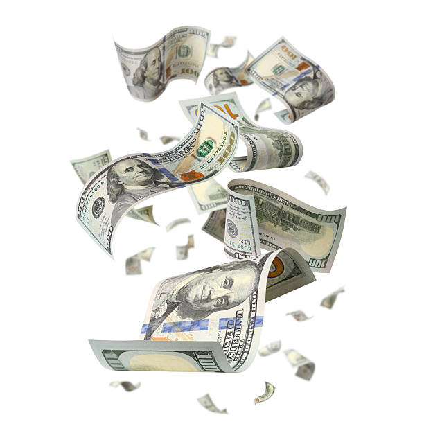 istock Flying hundred dollar bills, isolated on white background 2251713595