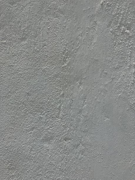 istock light gray textured wall surface with brush strokes and bumps 2251715021