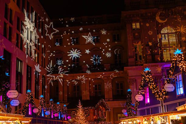 istock Illuminated Holiday Market with Festive Light Projections 2251717443