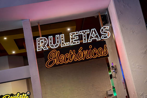 istock Neon Ruletas Electronicas sign promoting electronic roulette games inside modern casino interior 2251719998