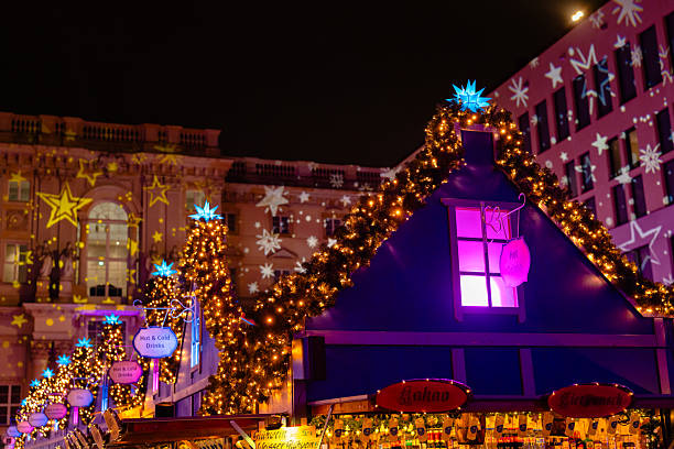 istock Illuminated Stalls and Building Projection Show at Christmas Fair 2251721377