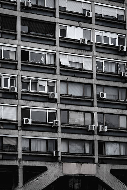 istock Residential  Brutalist  Apartment Block with Repetitive Windows 2251721756
