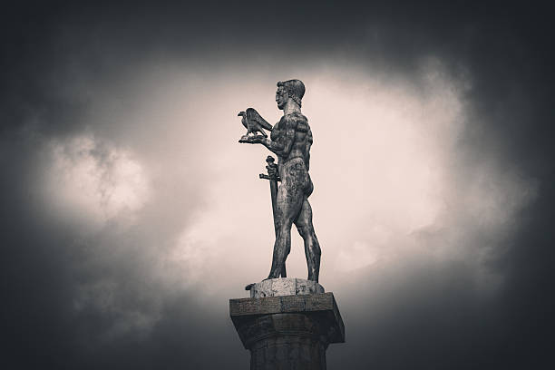 Monumental Statue on Tall Pedestal in Foggy Atmosphere