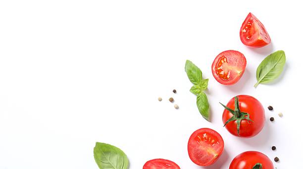 istock Fresh red tomatoes, pepper and basil on white background, top view 2251728160