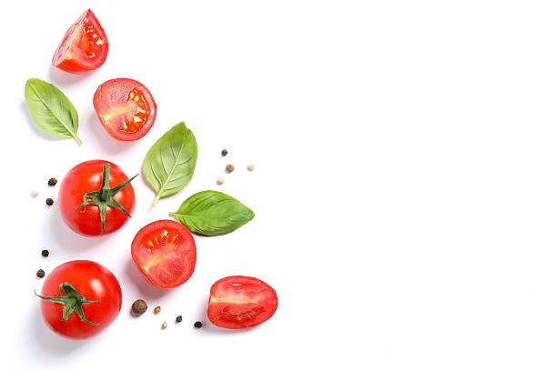 istock Fresh red tomatoes, pepper and basil on white background, top view 2251728163