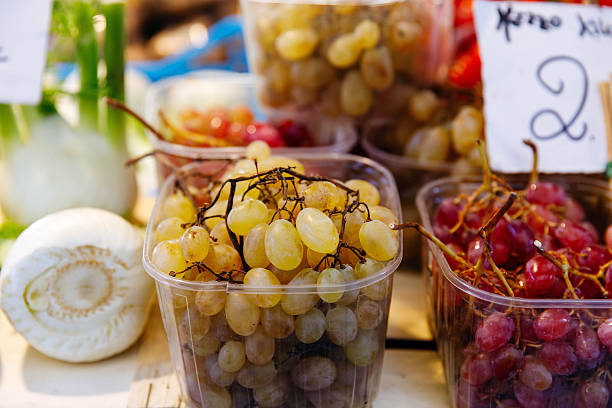 Fresh white and red grapes on display