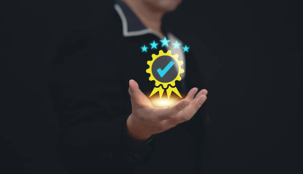 istock Concept of guarantee standards iso certification and standardization service quality and assurance : Businessman Is using finger touching for certify with five star after he has verified it. 2251729573