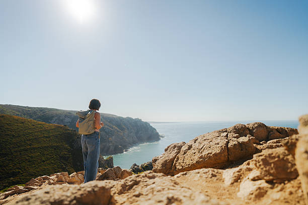 istock Tourist with backpack at Cabo da Roca Cape 2251731039