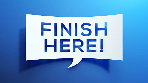 istock 3D Paper-Cut FINISH HERE Sign on Blue Background 2251736826