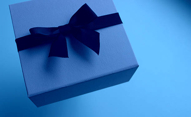 istock Blue Invitation Box With Ribbon Floating in Air Isolated on Clean Blue Backdrop 2251741762
