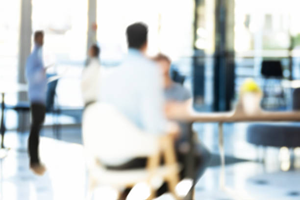 istock Blurred background of a bright and spacious modern office 2251743090
