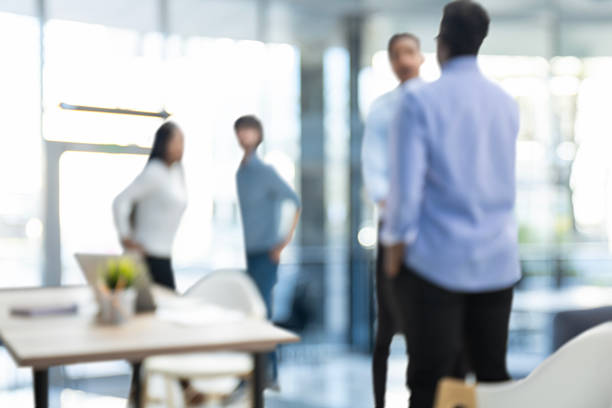 istock Blurred background of a bright and spacious modern office 2251743199
