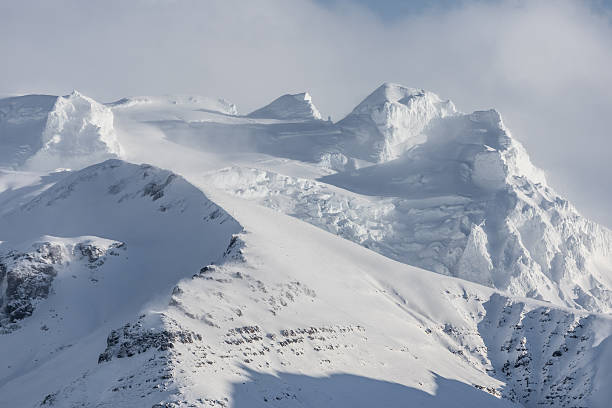 istock Snow covered mountain peaks near Krysuvik, Iceland. 2251743377