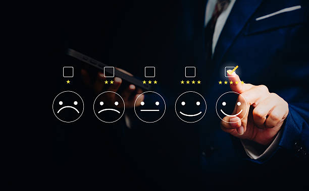 istock Customer satisfaction concept, businessman selecting five star smile rating interface, service feedback evaluation, user experience improvement, brand trust, quality performance measurement. 2251744061
