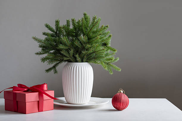 istock Creative Christmas tree made of fir branches in vase 2251746913