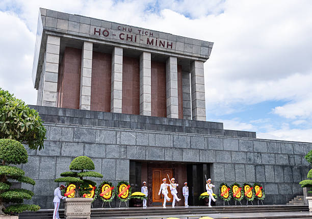 HANOI, VIETNAM – [Oct 20, 2025]: Honor guards perform a ceremonial changing of the guard outside the Ho Chi Minh Mausoleum in Ba Dinh Square, Hanoi.