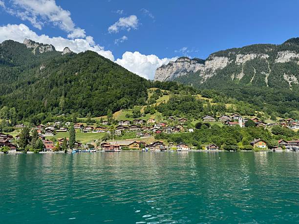 istock View of Lake Thun and mountains under summer clouds. 2251761049
