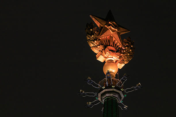 Evening close view of the Kremlin star. Ruby stars are installed on the spires of the Moscow Kremlin towers.